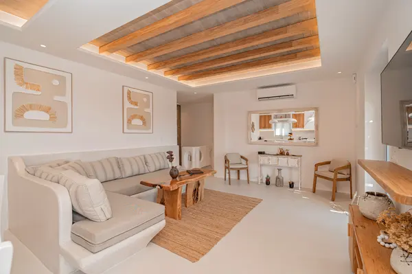 Living room with built-in seating at Terra & Olive Villa in Naxos