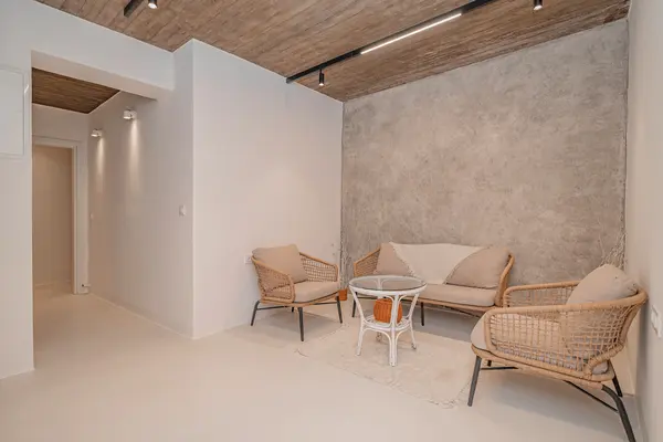 Quiet seating corner beside the bedroom at Terra & Olive Villa in Naxos