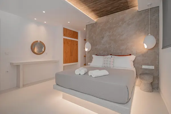 Double bedroom with soft lighting at Terra & Olive Villa in Naxos